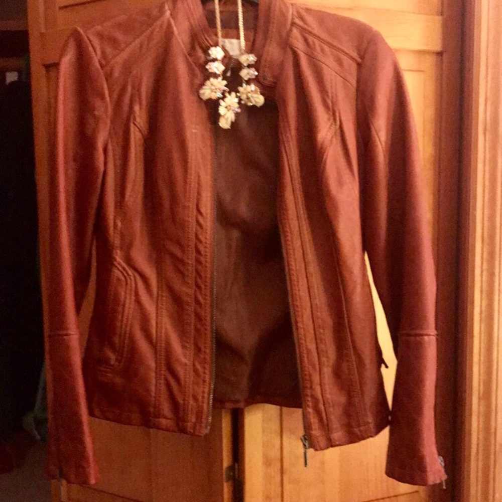 Tan leather jacket ( not real leather)